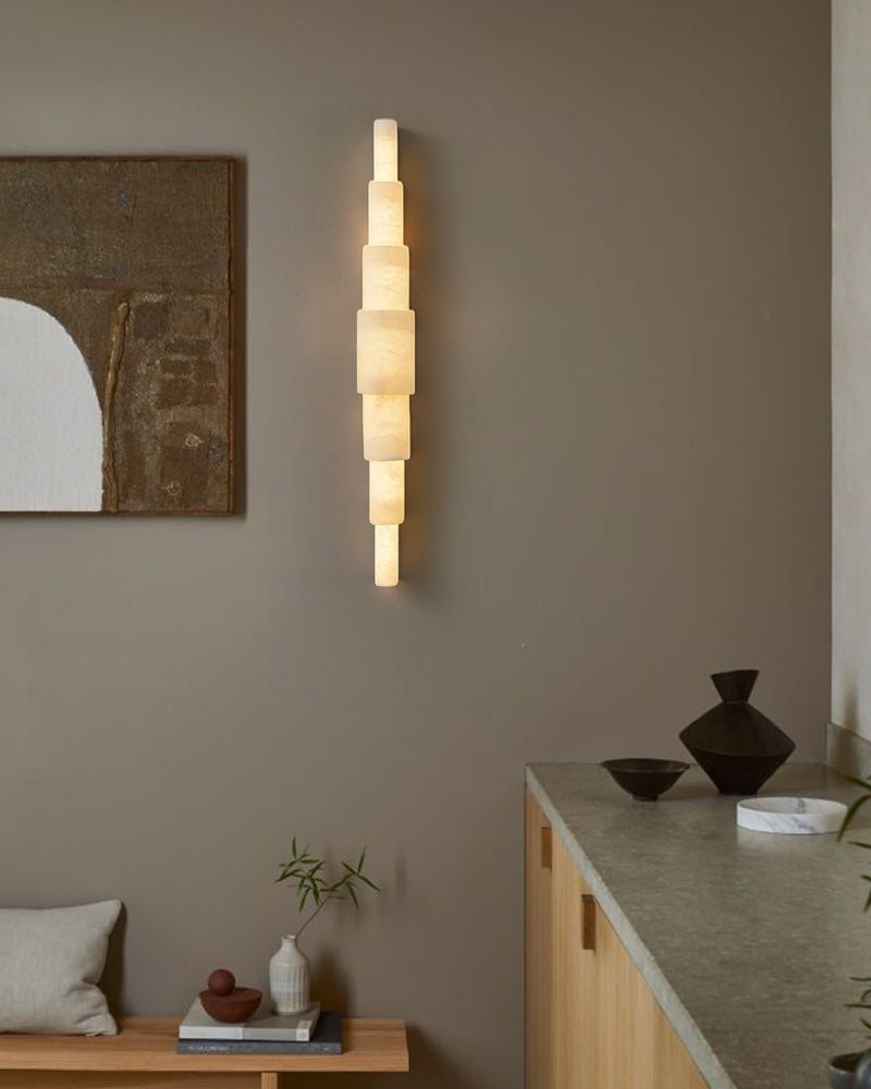 Scandinavian Designer Wall Washer Sconces | White Alabaster Shade flush mounted in bedroom