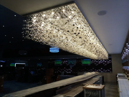 Milky Way and Extra-Large Crystal Chandeliers Illuminate the Space